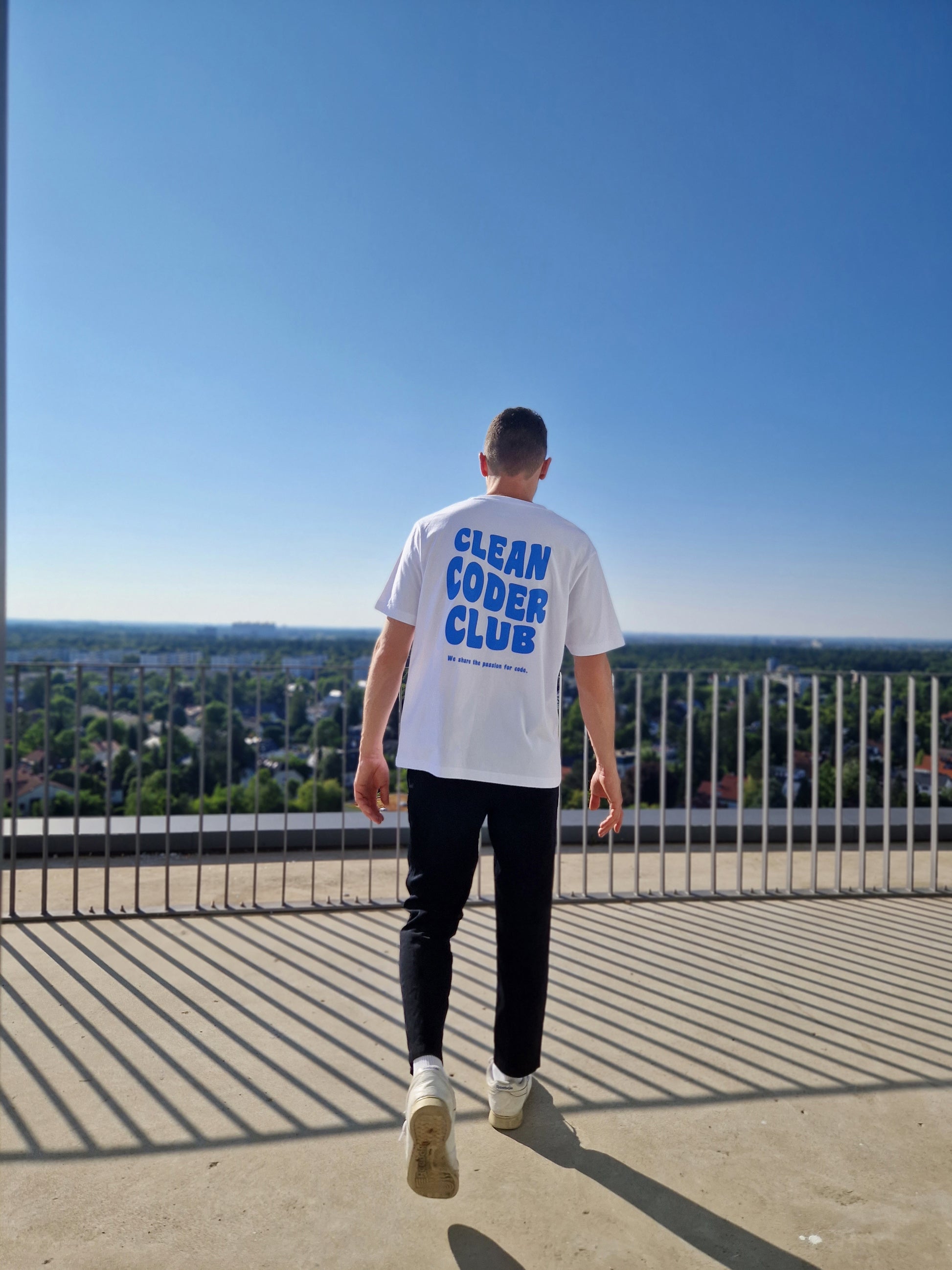 Men wearing the Coder / Programmer t-shirt "Clean Coder Club" in white