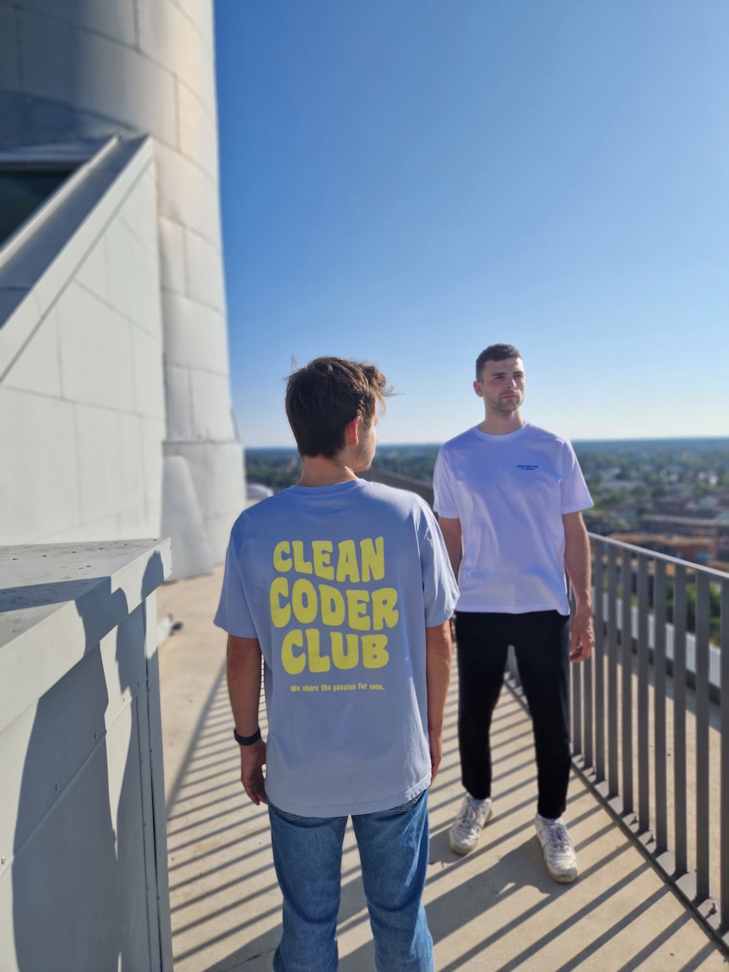 Men wearing the Coder / Programmer t-shirt "Clean Coder Club" in blue